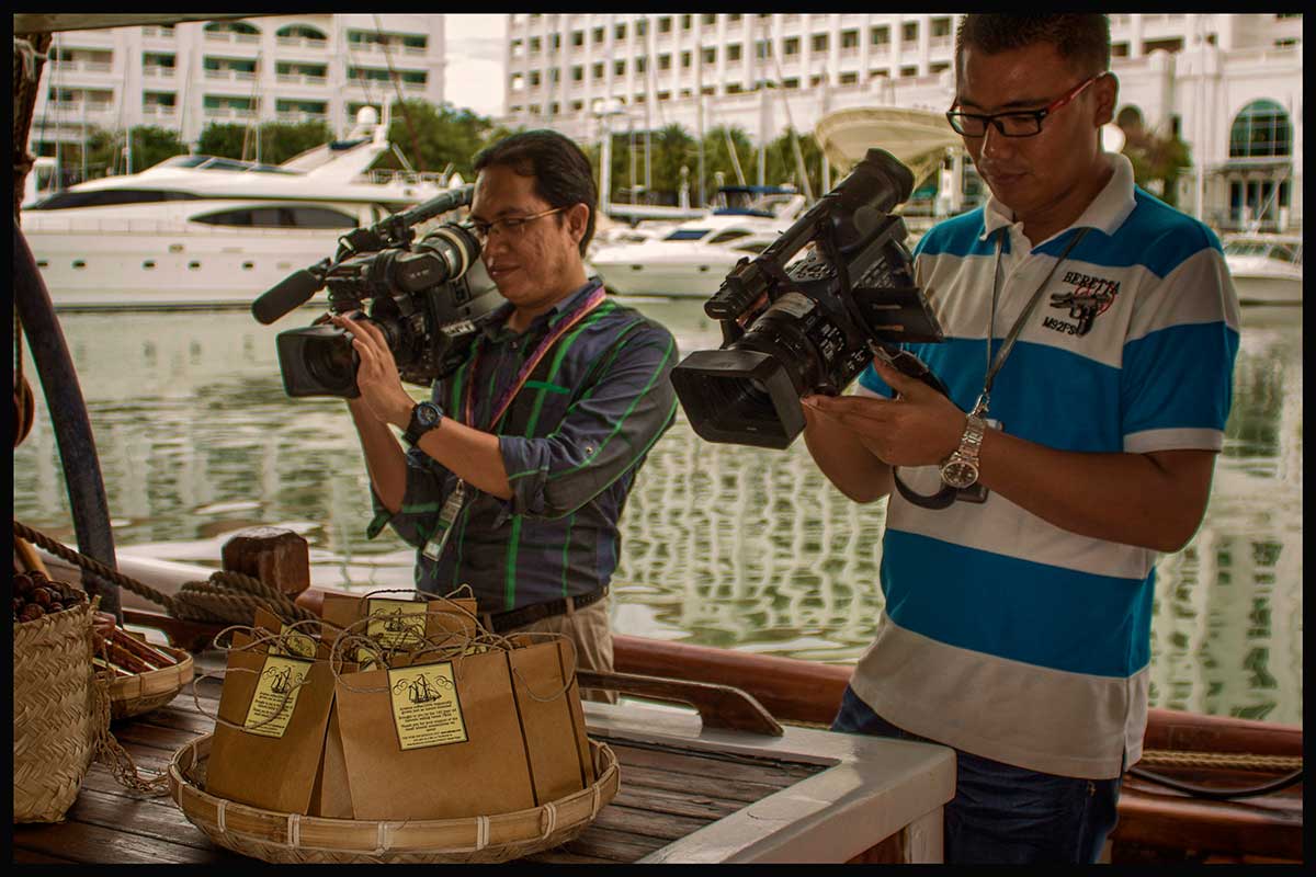 The press had a great time on board opening day. The small bags contain wild mountain coffee from East Timor.
