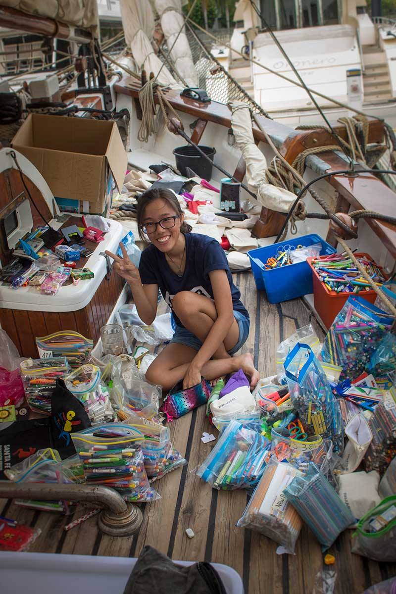 Before we can make up the teacher bags and school boxes we must sort what we have. What a job that was. — with Hui Qi.