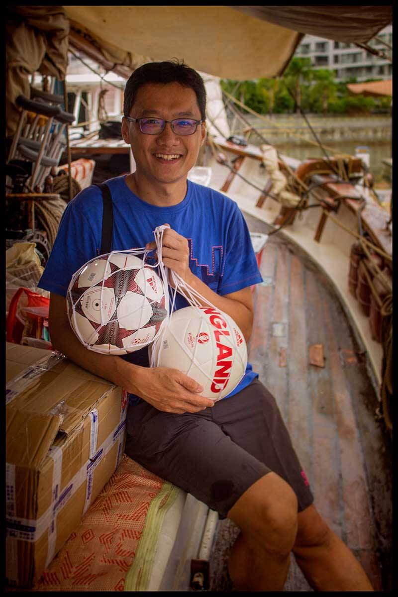 Two new footballs will make some small school very happy for sure thanks to our friend Kwek Loong Chin.
