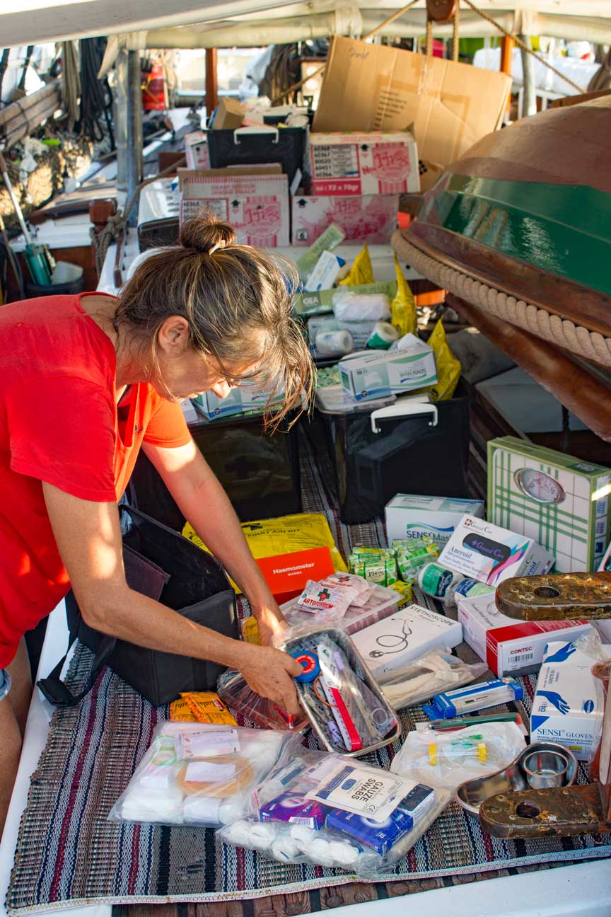 Meggi sorting midwife kits for this years deliveries.