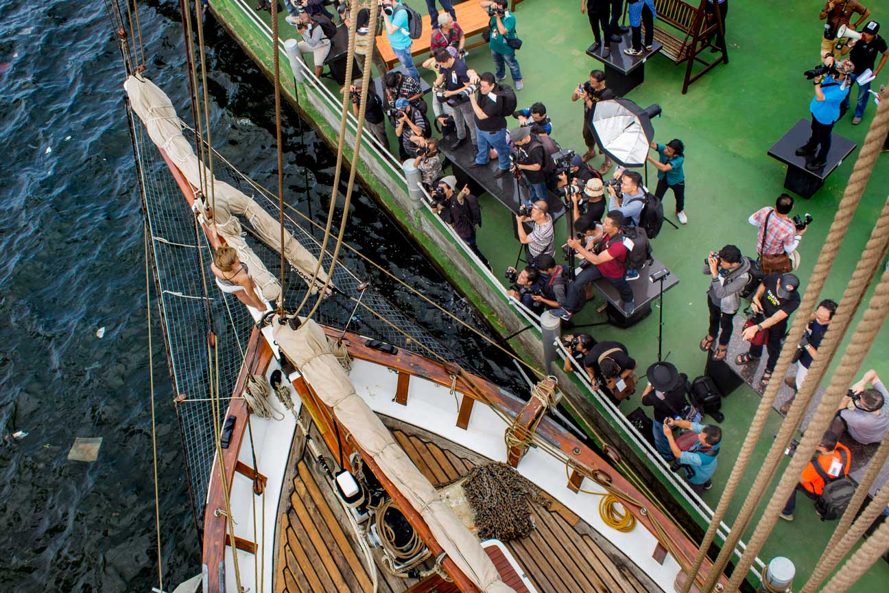 Nikki is one of Indonesia\'s top models. Here she poses on Vega\'s bowsprit.